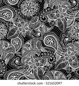 Seamless vintage freehand drawing pattern. Handwritten white ornament on black background. Vector Illustration. Used for fabrics, wallpapers, wrapping, scrap-booking, web sites, flyers, invitation