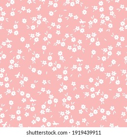 seamless vintage patern. pink background. small white flowers. vector texture. print for textiles and wallpaper.
