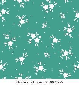 Resumen de patrones vintage sin inconvenientes. flores blancas lindas y hojas sobre un fondo verde. textura vectorial. impresiones brillantes de moda para textiles, papel pintado y embalajes.