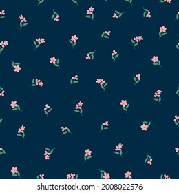 Seamless vintage pattern abstract. dark blue background . small pink flowers. green leaves. vector texture. fashionable print for textiles and wallpaper.