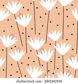 Seamless vintage pattern abstract. light coral background. white flowers. black dots. vector texture. trend print for textiles and wallpaper.