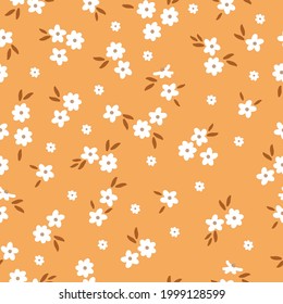 Resumen de patrones vintage sin inconvenientes. fondo naranja. flores blancas. hojas naranjas oscuras. textura vectorial. impresión de tendencia para textiles y papel pintado.
