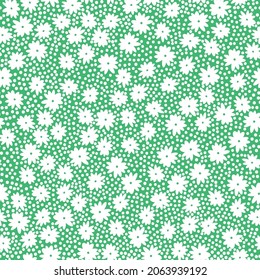 Resumen de patrones vintage sin inconvenientes. flores blancas pequeñas y puntos sobre un fondo verde brillante. textura vectorial. impresión de moda para textiles, papel pintado y embalaje.
