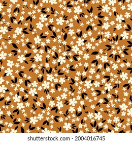 Seamless vintage pattern abstract. terracotta background. small white flowers. black leaves. vector texture. trend print for textiles and wallpaper.

