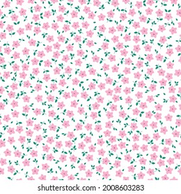 Seamless vintage pattern abstract. white background. small pink flowers. green leaves. vector texture. trend print for textiles and wallpaper.