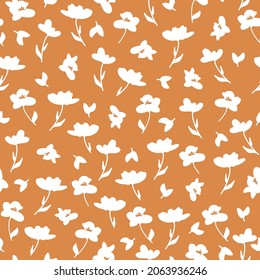 Seamless vintage pattern abstract. wonderful white flowers and leaves on a terracotta background. vector texture. fashionable print for textiles, wallpaper and packaging.