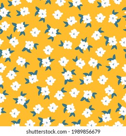 seamless vintage pattern abstract. yellow background. white flowers, green leaves. vector texture. trend print for textiles and wallpaper.