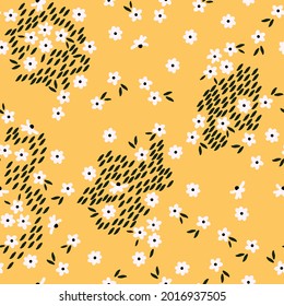 Seamless vintage pattern abstract. yellow background . small white flowers. black leaves and spots . vector texture. trend print for textiles.
