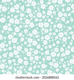 Seamless vintage pattern . beautiful ornament of white flowers and leaves on a mint background. vector texture. trend print for textiles and wallpaper.
