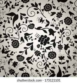 Seamless vintage pattern with black flowers on gray background