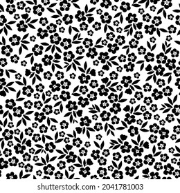 Seamless vintage pattern. black ornament. Wonderful black flowers and leaves on a white background. vector texture. trend print for textiles and wallpaper.