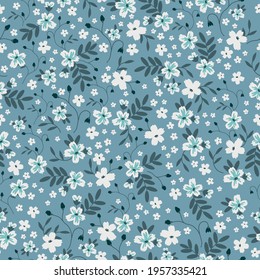 seamless vintage pattern. blue background. white flowers. vector texture. beautiful print for textiles and wallpaper.