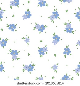 Seamless vintage pattern. blue flowers, green leaves on a white background. vector texture. trend print for textiles and wallpaper.