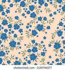 Seamless vintage pattern. Blue flowers, green leaves. Beige background. vector texture. fashionable print for textiles, wallpaper and packaging.