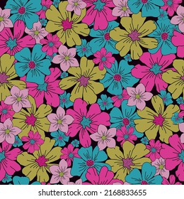 Seamless vintage pattern. Bright colored flowers on a black background. Fashionable print for textiles and wallpaper.