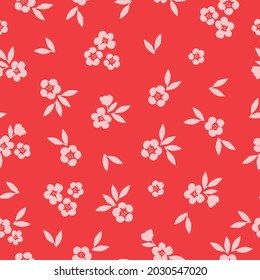 Seamless vintage pattern. cute ornament of light pink flowers and leaves on a red background. vector texture. trend print for textiles and wallpaper.