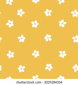 Seamless vintage pattern. cute white flowers on a yellow background. vector texture. An elegant template for fashionable prints.