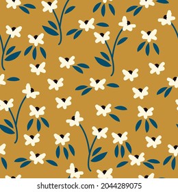 Seamless vintage pattern. cute white flowers,blue leaves on a mustard background. vector texture. trend print for textiles and wallpaper.