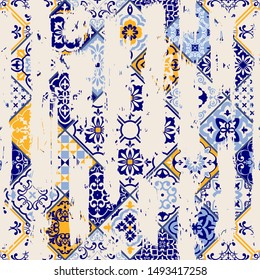 Seamless vintage pattern with an effect of attrition. Patchwork tiles. Hand drawn seamless abstract pattern from tiles. Azulejos tiles patchwork. Portuguese and Spain decor.