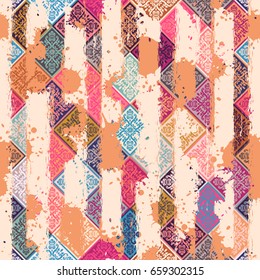 Seamless vintage pattern with an effect of attrition. Patchwork tiles. 