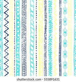 Seamless vintage pattern. Ethnic and tribal motifs. Grunge texture. Blue, yellow and white colors. Vector illustration.