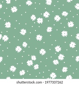 seamless vintage pattern. green background. small white flowers and white dots. vector texture. fashionable print for textiles and wallpaper.