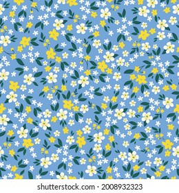 Patrón vintage sin foco. fondo azul claro. flores pequeñas blancas y amarillas. hojas verdes. textura vectorial. impresión de tendencia para textiles y papel pintado.