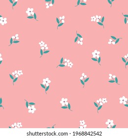 Seamless vintage pattern . light pink background. white flowers, green leaves. vector texture. fashionable print for textiles and wallpaper.