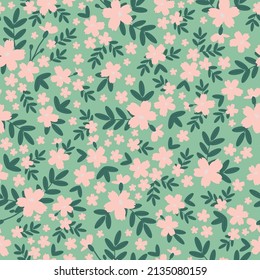 Seamless vintage pattern. Light pink flowers, green leaves. Light green background. vector texture. fashionable print for textiles, wallpaper and packaging.