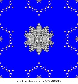 Seamless vintage pattern on blue background with golden elements. White mandala.