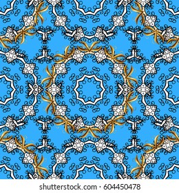 Seamless vintage pattern on blue background with golden elements and with white doodles. Christmas, snowflake, new year.