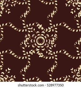 Seamless vintage pattern on dark brown background with golden elements.