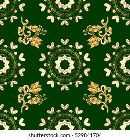 Seamless vintage pattern on green background with golden elements.