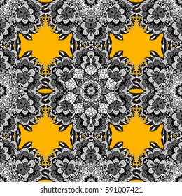 Seamless vintage pattern on yellow background with white elements and with white doodles. Christmas, snowflake, new year.