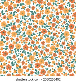 Seamless vintage pattern. orange flowers and green leaves on a white background. vector texture. trend print for textiles.