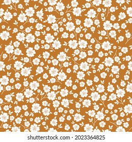 Seamless vintage pattern. The ornament is white flowers and leaves on a terracotta background. Vector texture . Trend print for textiles and wallpaper.