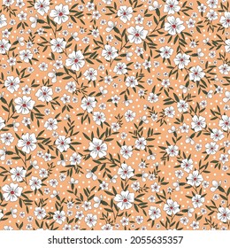 Seamless vintage pattern. The ornament is white flowers and dots, green leaves on a light orange background. vector texture. trend print for textiles, wallpaper and packaging.