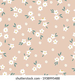 Seamless vintage pattern. pale beige background. white flowers. vector texture. trend print for textiles and wallpaper.