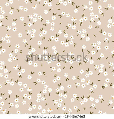 seamless vintage pattern . pale beige background. small white flowers . vector texture. elegant trend print for textiles and wallpaper.