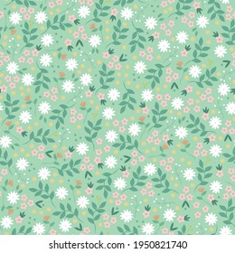 seamless vintage pattern. pale green background. small pink and white flowers. vector texture. delicate print in pastel colors for textiles.