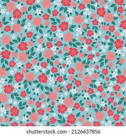 Seamless vintage pattern. Red, pink and white flowers, green leaves. Light blue background. vector texture. fashionable print for textiles, wallpaper and packaging.