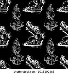 Seamless vintage pattern with silhouettes on ancient Mexican Indian art on black background. Based on hand drawn linear sketches.