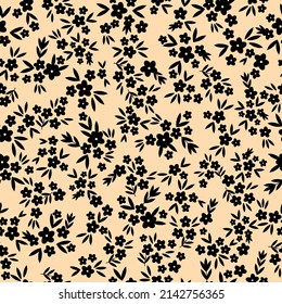Seamless vintage pattern. small black flowers and leaves. beige background. vector texture. fashionable print for textiles, wallpaper and packaging.
