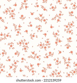 seamless vintage pattern. small orange flowers and leaves. white  background. vector texture. fashionable print for textiles and wallpaper.