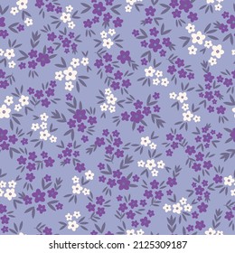 Seamless vintage pattern. Small purple and white flowers . Lilac background. vector texture. fashionable print for textiles, wallpaper and packaging.