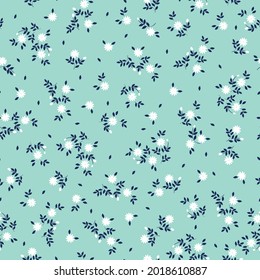 Seamless vintage pattern. small white flowers ,dark blue leaves on a light blue background. vector texture. trend print for textiles and wallpaper.
