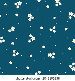 Nahtloses Vintage-Muster. kleine weiße Blumen und Punkte. dunkelblauer Hintergrund. Vektorstruktur. Trenddruck für Textilien und Tapeten.