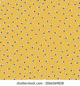Seamless vintage pattern. small white flowers on a yellow background. vector texture. fashionable print for textiles, wallpaper and packaging.