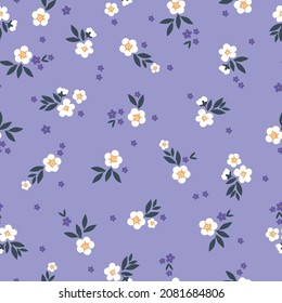 Seamless vintage pattern. Small white and purple flowers. lilac background. vector texture. Fashionable print for textiles and wallpaper.