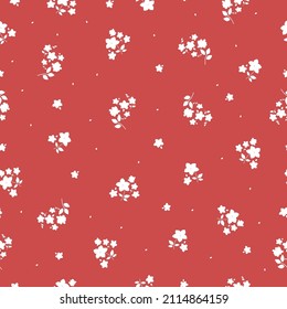 Seamless vintage pattern. Small white flowers and leaves. Red background. vector texture. fashionable print for textiles, wallpaper and packaging.